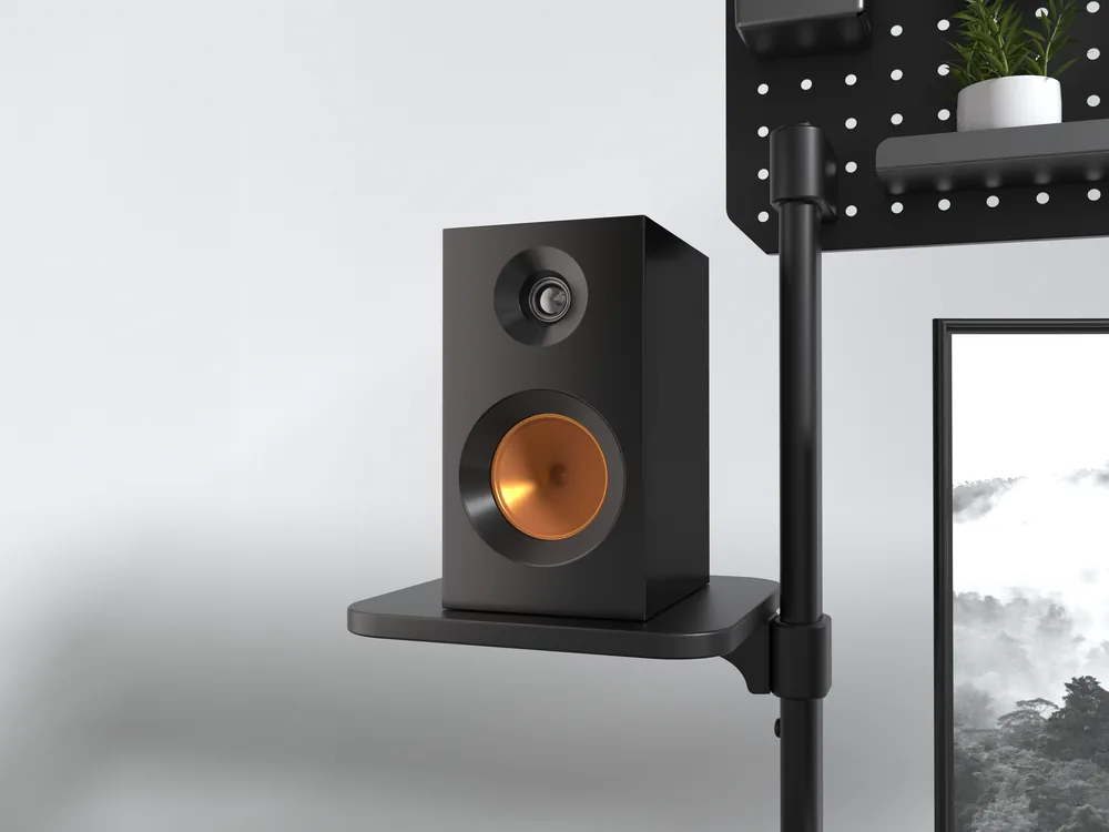 Plataforma lateral de la mesa E-ODYSSEY con un altavoz encima